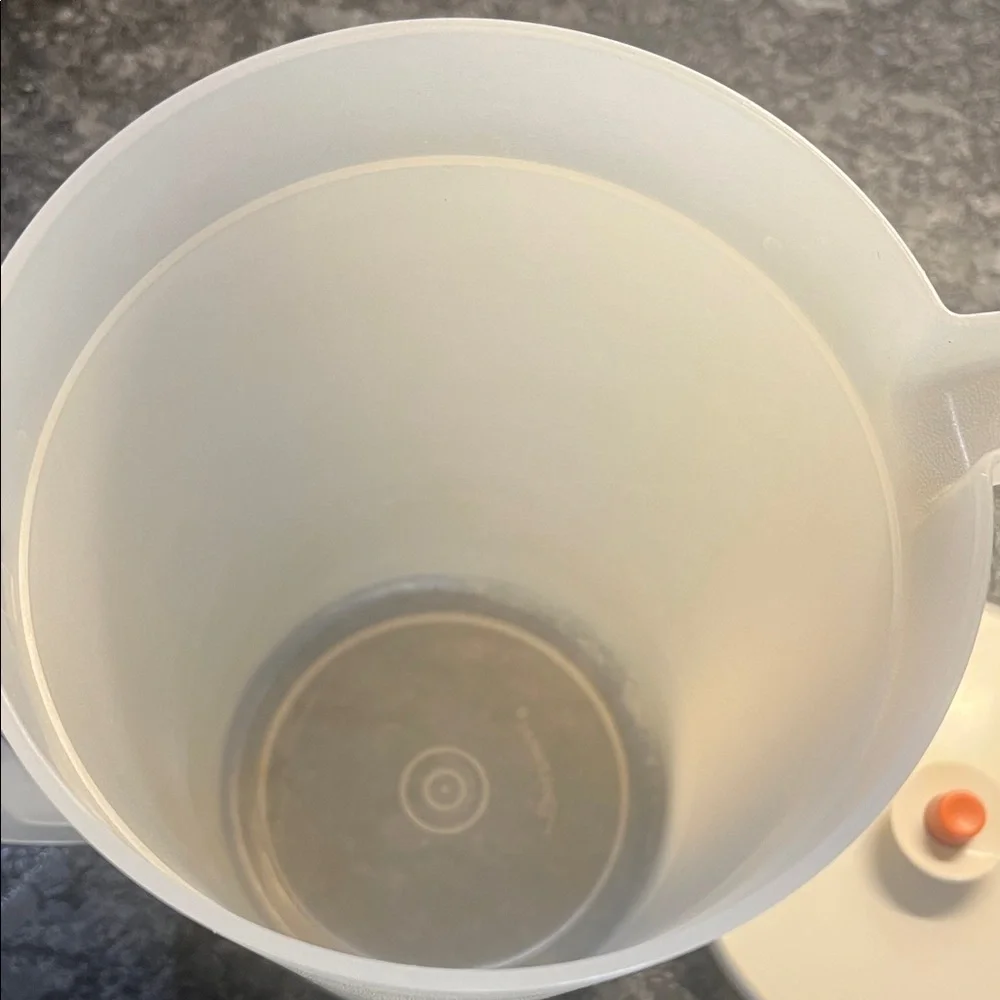 Vintage Tupperware One Gallon Translucent White Pitcher with Orange Lid.